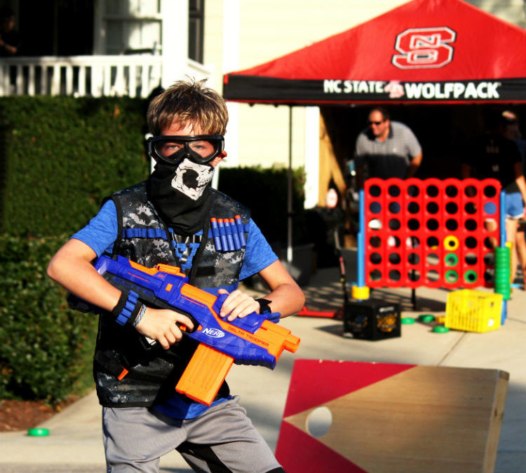 Kid in Nerf Gear With other games in background